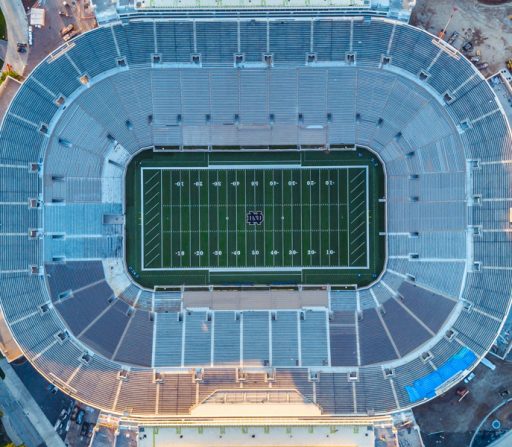 an aerial view of Notre Dame football stadium with empty seats
