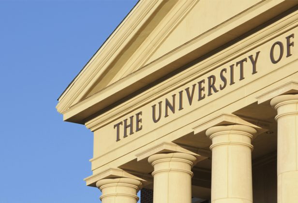 a building that says "the university of" on it