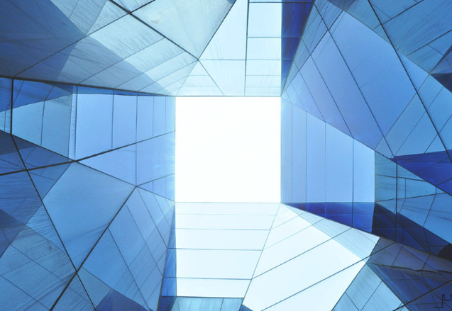 geometric pattern in blue with a white square in the center